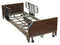 DM 15235BVPKG1 EA/1 Delta Ultra Light Full Electric Low Hospital Bed with Half Rails and Innerspring Mattress